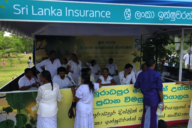 Sri Lanka Insurance provides three decades of unceasing assistance to Poson pilgrims of Anuradhapura